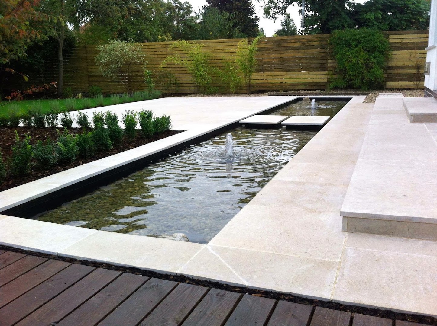 Still water feature with stepping stones